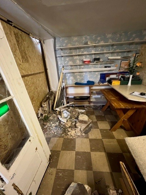 Rubble & debris inside the shop behind the damaged frontage